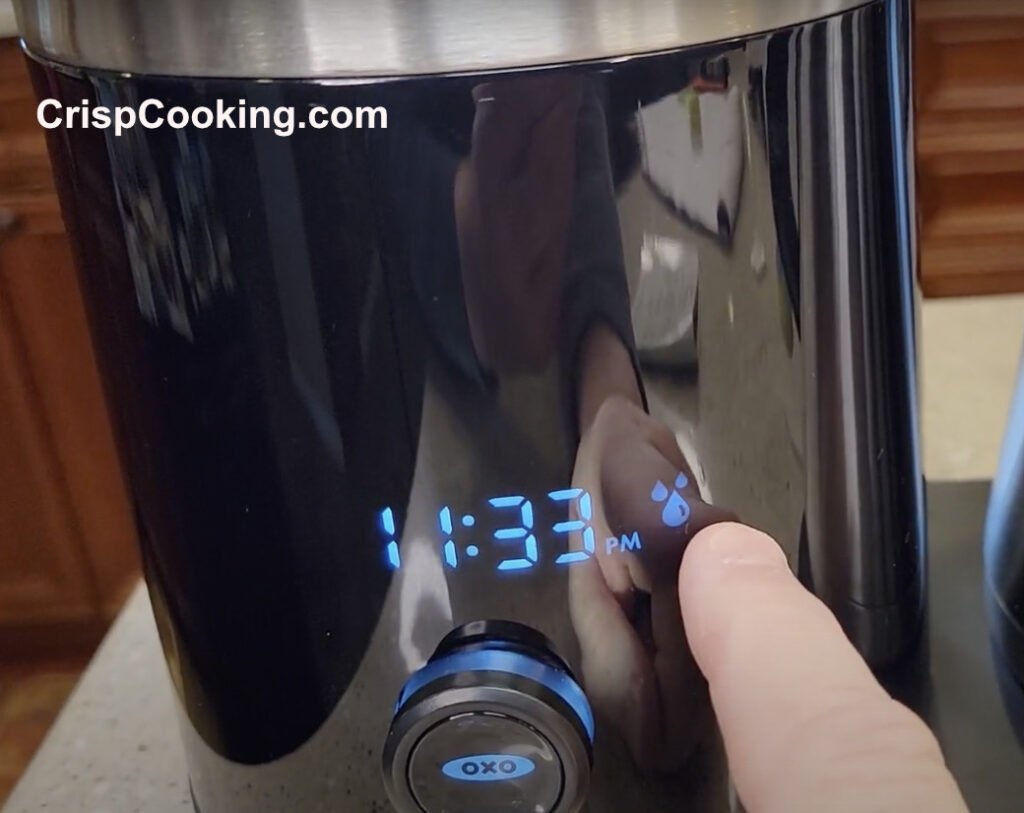 Blue light turns on when Oxo coffee maker starts cleaning