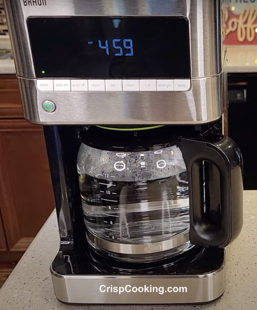 Brew of water with vinegar is complete on Braun coffee maker