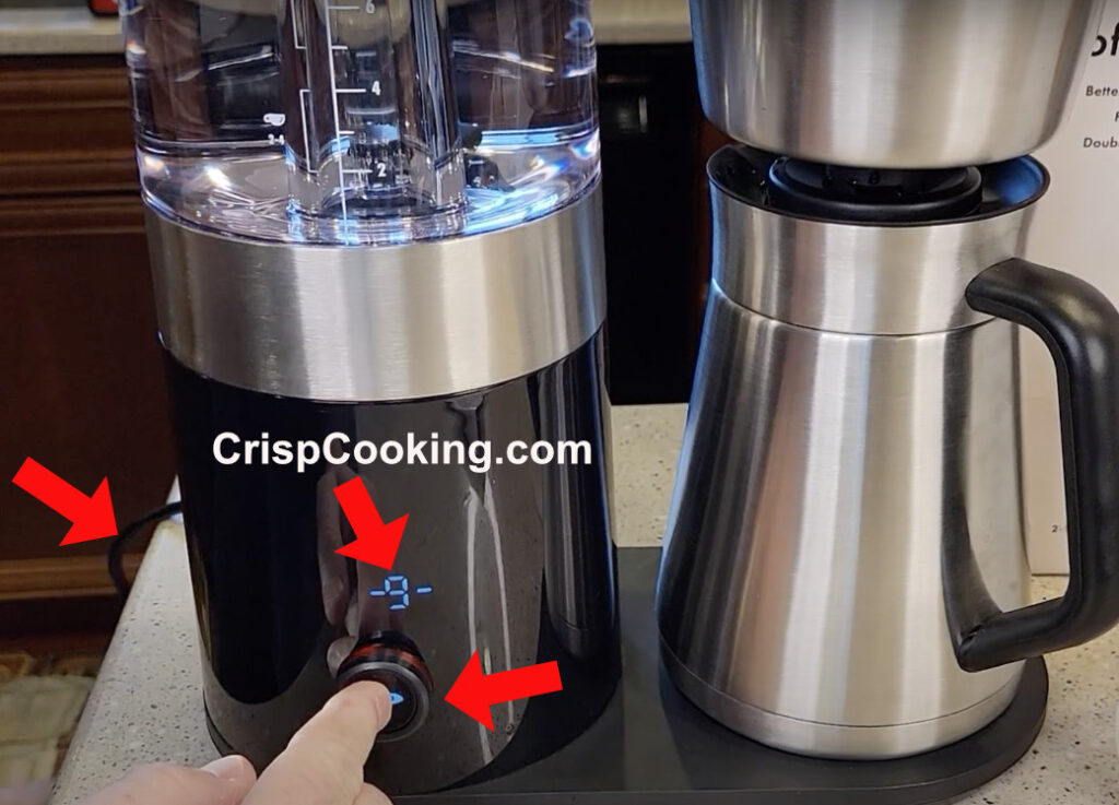 Plug and Press Button at the same time on Oxo coffee maker