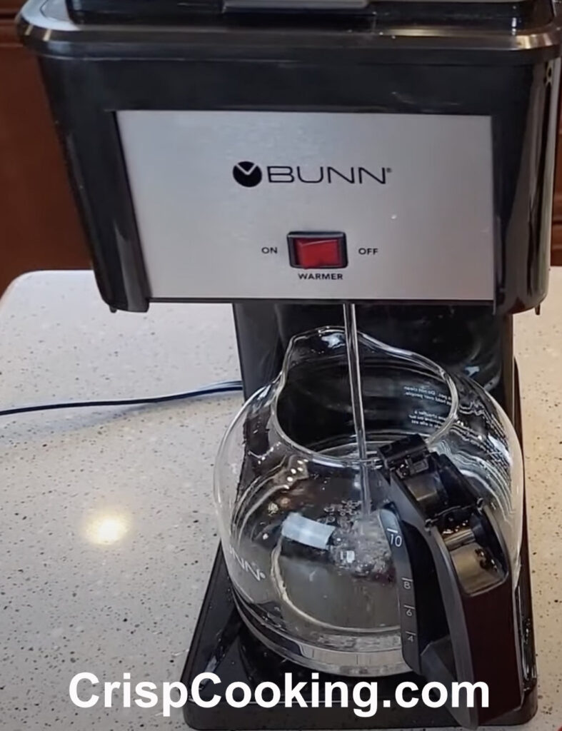 Remove Carafe Lid and basket of Bunn coffee maker