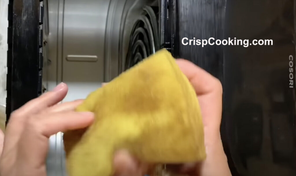 Dirty sponge from cleaning inside cosori air fryer