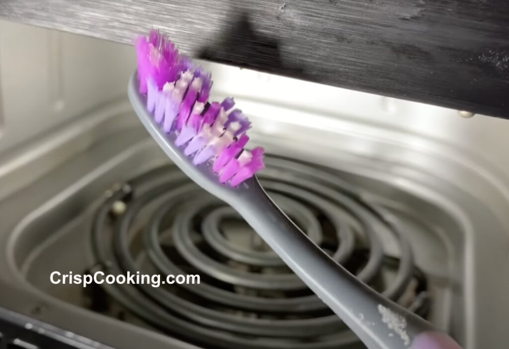 Soft bristle tooth brush to clean around heating element of cosori air fryer