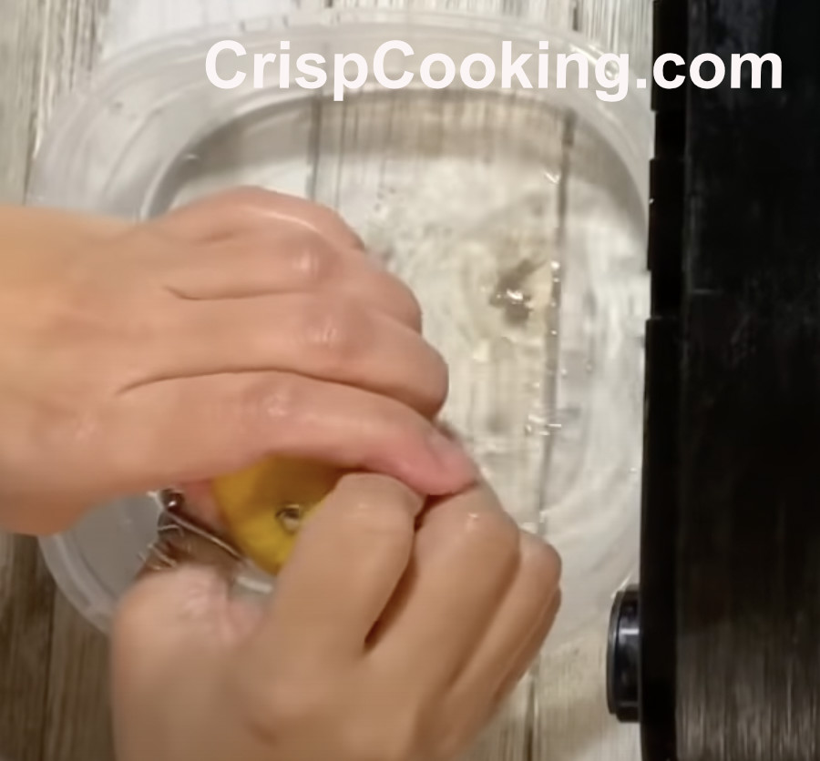 Squeeze lemon juice in water to clean cosori air fryer